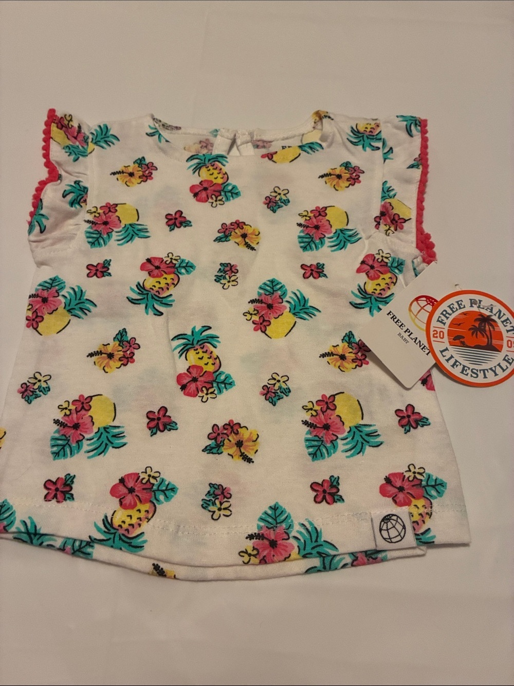 Free Planet White Short Sleeve Tee with Pink Trim and Tropical Print